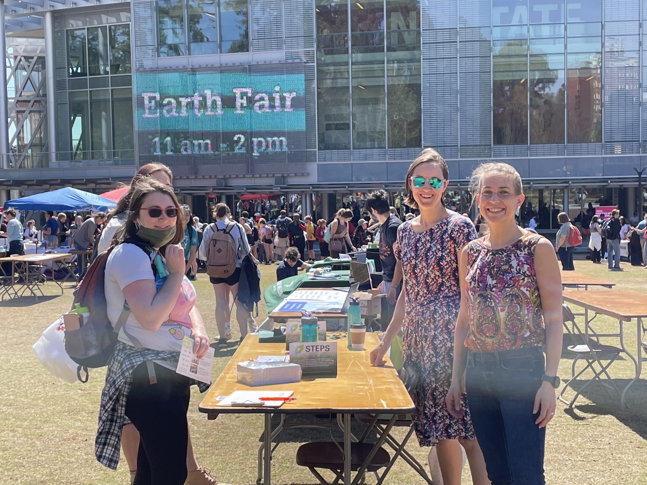 Maude Cuchiara with scholars at the NCSU Earth Fair. 